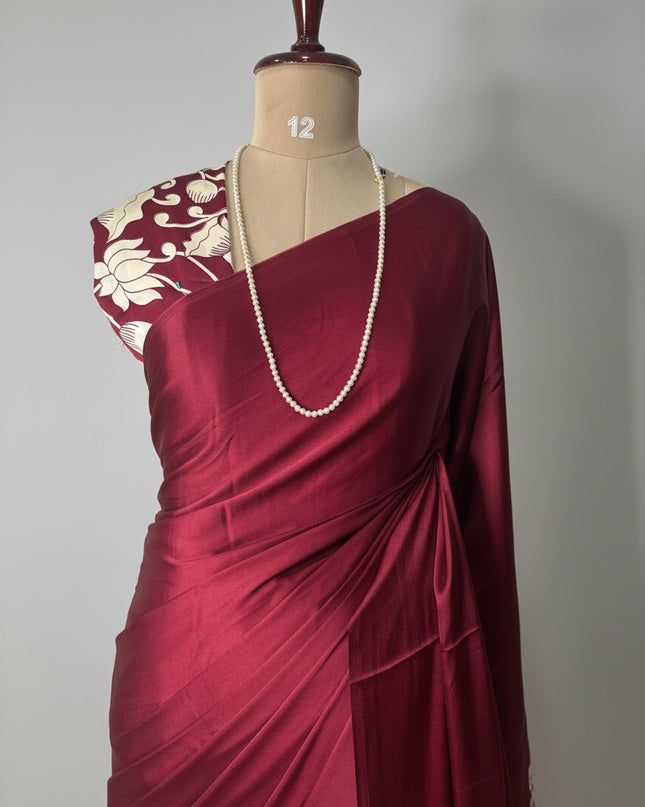 Maroon kalamkari print modal satin crepe saree
